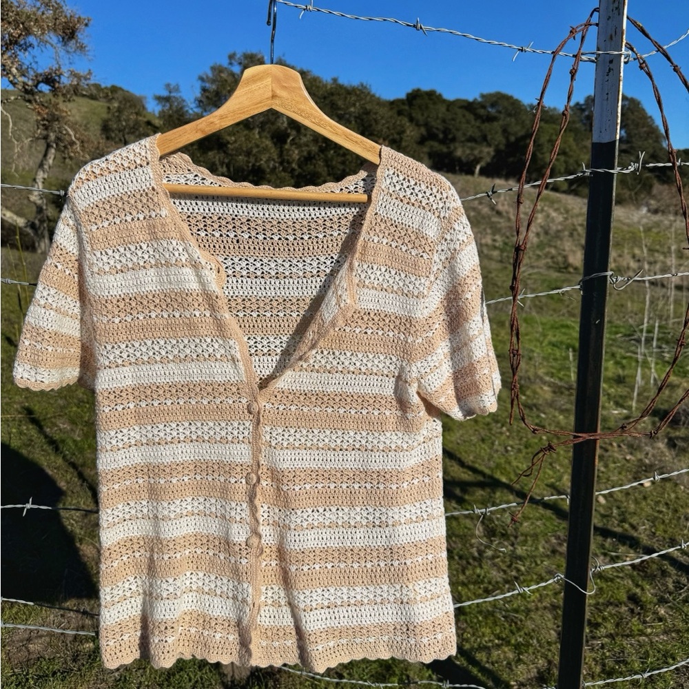 Cream and beige short sleeved crocheted blouse. Size medium